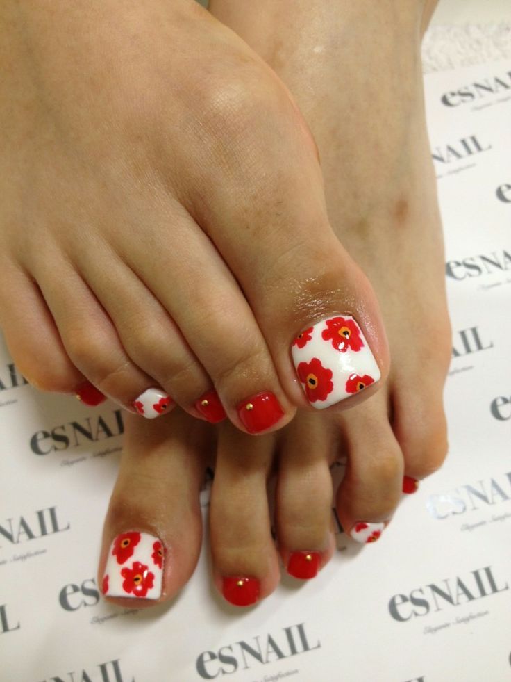 red and white flower nails