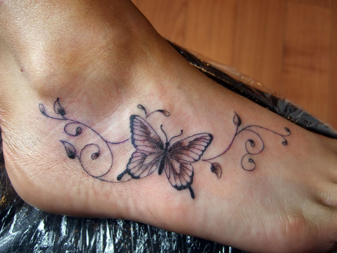 6. Hand Vine and Butterfly Tattoo - wide 2