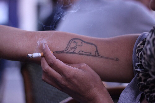Elephant half sleeve tattoo with infinity symbol by script
