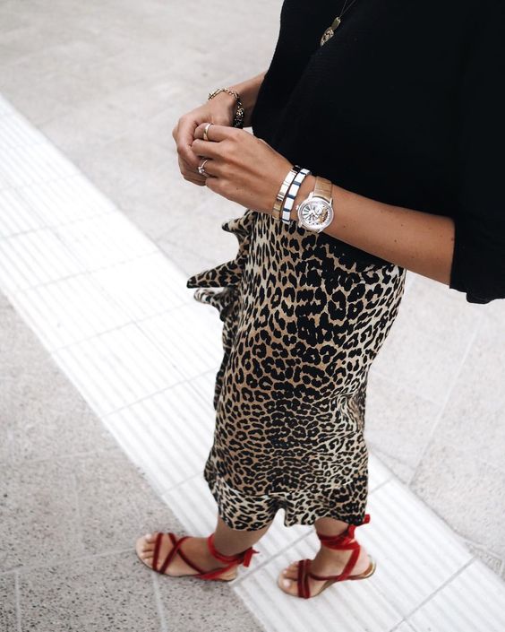 leopard print top with black skirt